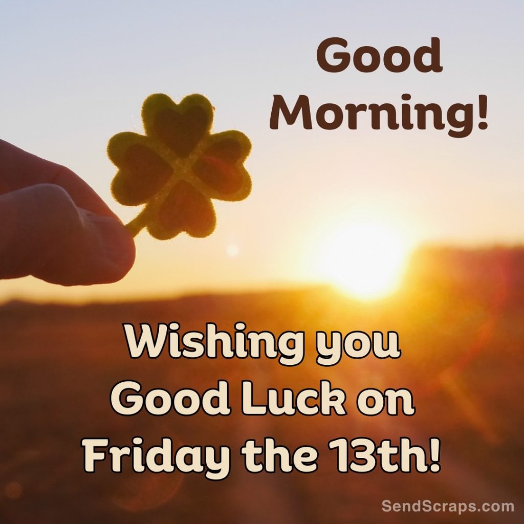 Sunrise with fingers holding a four leaf clover and Friday the 13th message