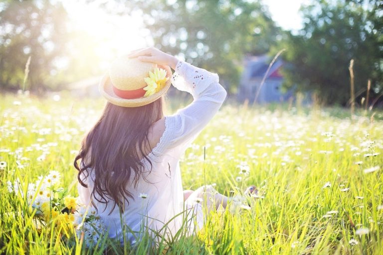 Woman in a sunny field